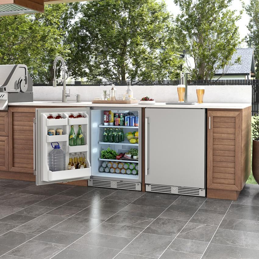 Zephyr outdoor refrigerator installed in luxury outdoor kitchen